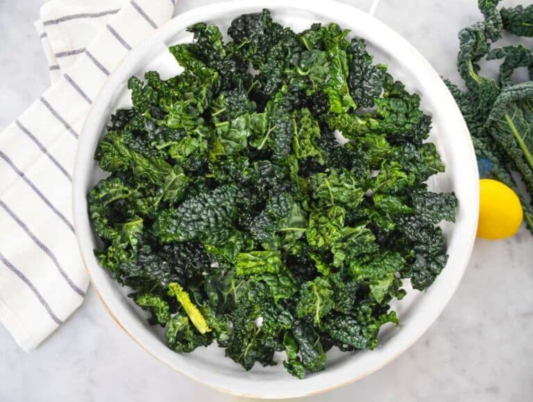Step 1 Massaged kale leaves with lemon and salt in large mixing bowl.
