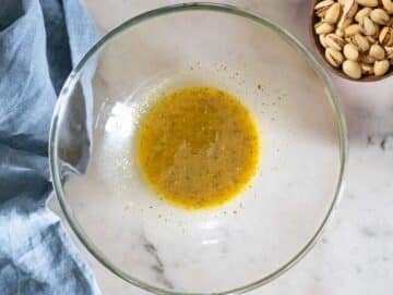 Step 2 Making the dressing in a bowl with olive oil vinegar honey and mustard.