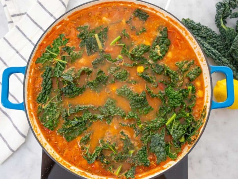 Step 3 Orzo and kale cooking together in broth.