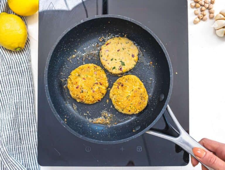 Step 3 Pan frying chickpea patties in olive oil until crispy and golden brown.