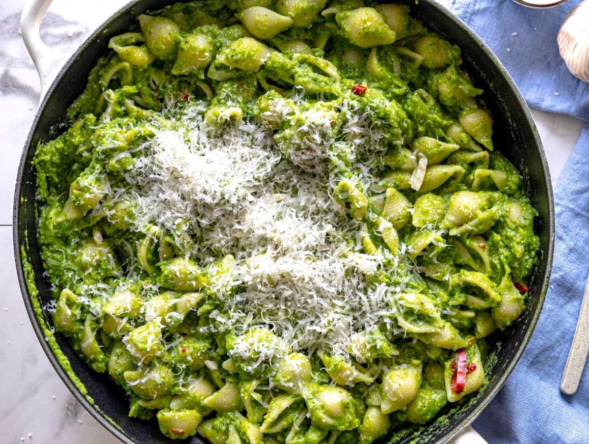 Step 3 Pasta tossed in creamy smashed broccoli sauce with parmesan and pasta water in skillet.