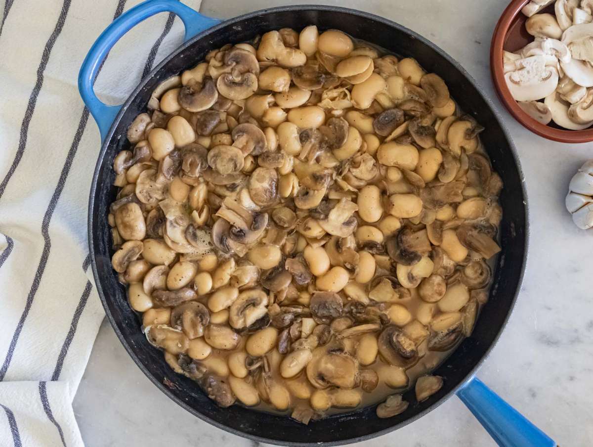 Step 3 Pouring Marsala wine and broth into skillet to make flavorful Italian inspired sauce.