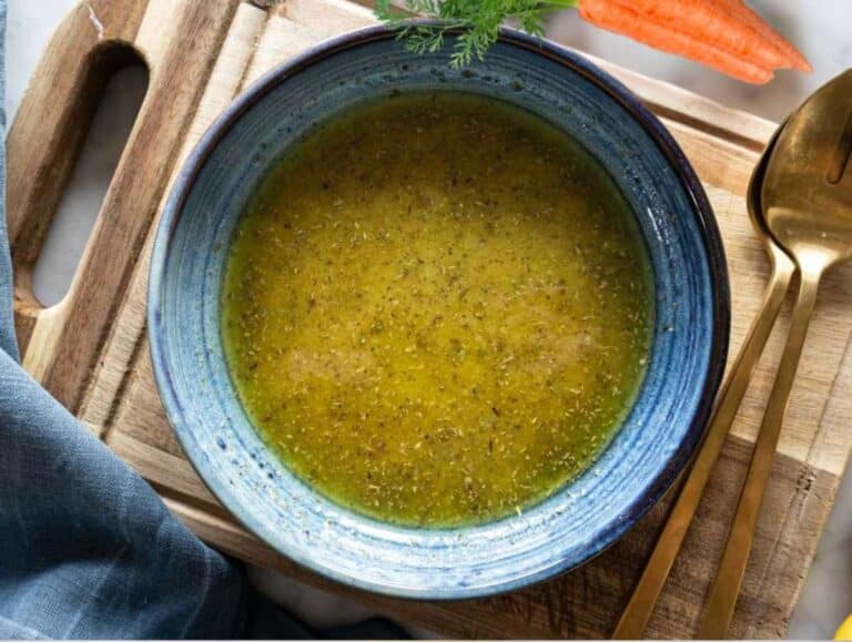 Step 3 Whisking olive oil mustard honey vinegar and oregano in small bowl for the dressing.