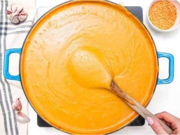 Step 3 blending lentil soup with potatoes until creamy.