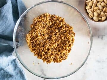 Step 3 marinating lentils in dressing to boost flavor while waiting for the sweet potatoes to cook.