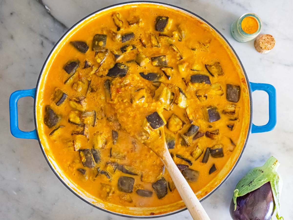Step 4 Roasted eggplant and coconut milk stirred into the pot to make curry creamy.