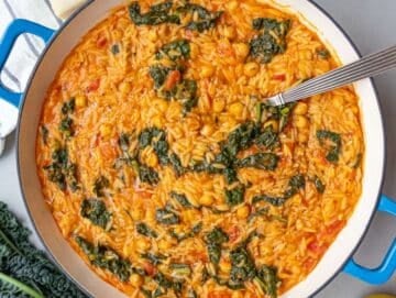 Step 4 Tuscan Orzo with Chickpeas and Kale finished with parmesan and lemon zest.