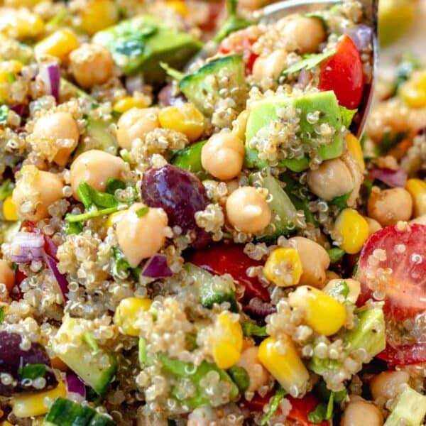 Bright Mediterranean quinoa salad with chickpeas and veggies perfect for healthy meal prep lunches.