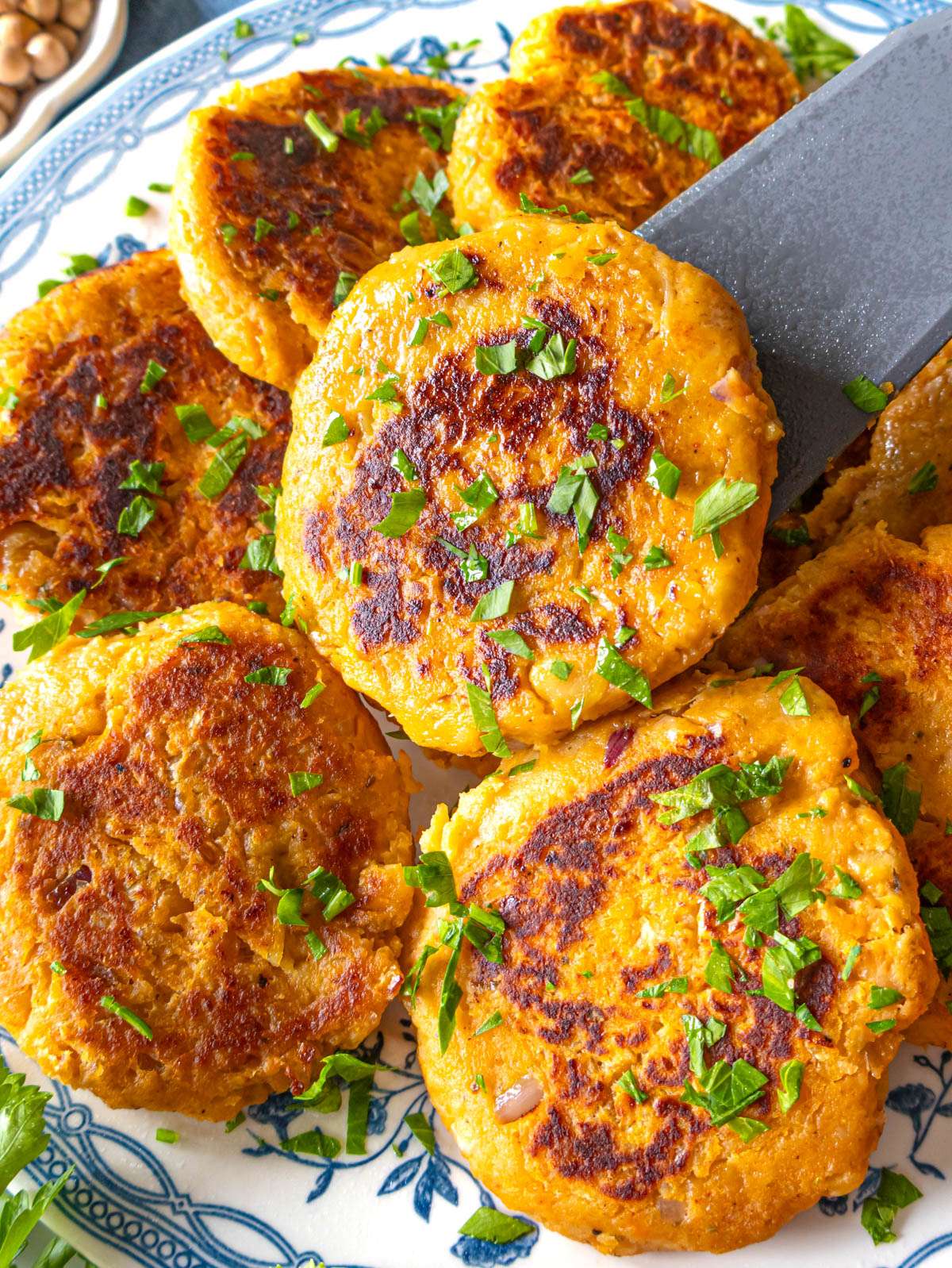 Crispy chickpea sweet potato patties with golden crust and tender center.