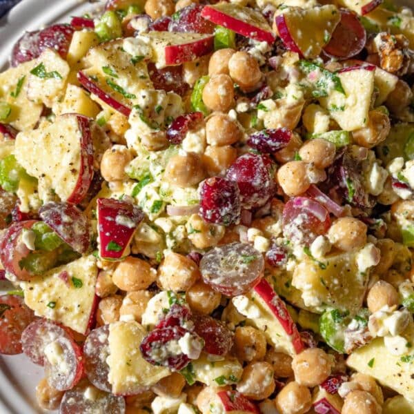 Festive chickpea cranberry salad with honey feta dressing perfect for holidays and family meals.