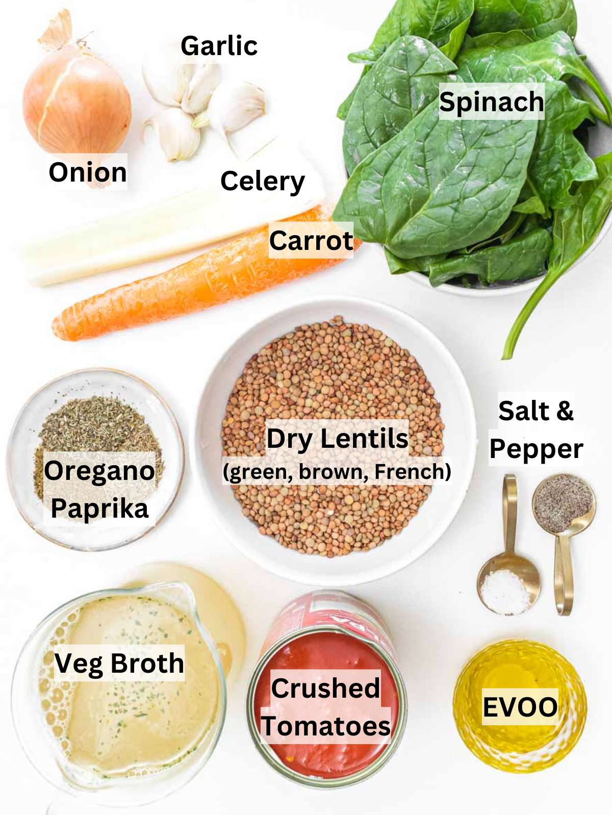 Fresh ingredients for spinach lentil soup including lentils, spinach, tomatoes, and vegetables.