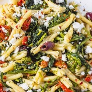 Mediterranean pasta with broccoli rabe and feta up close.