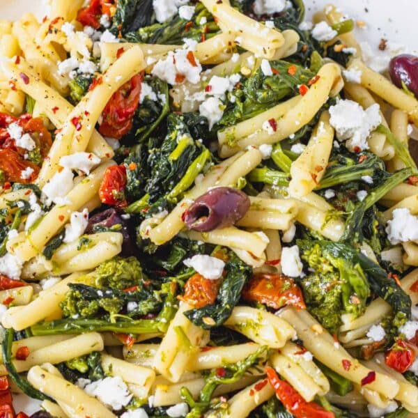 Mediterranean pasta with broccoli rabe and feta up close.