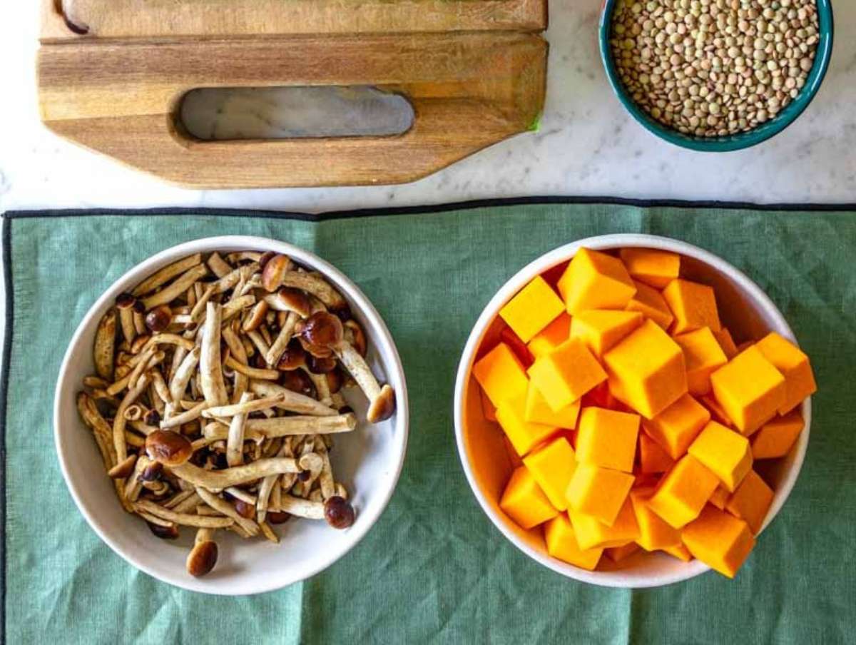 Step 1 Chopped pumpkin mushrooms and vegetables ready to cook for lentil pumpkin stew.