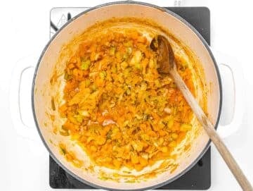 Step 1 Cooking onion carrot celery leek and garlic in olive oil for flavor base.