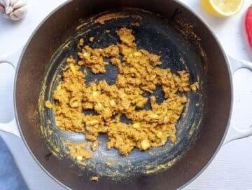 Step 1 Onions garlic ginger and spices cooking in a skillet for chickpea masala base.