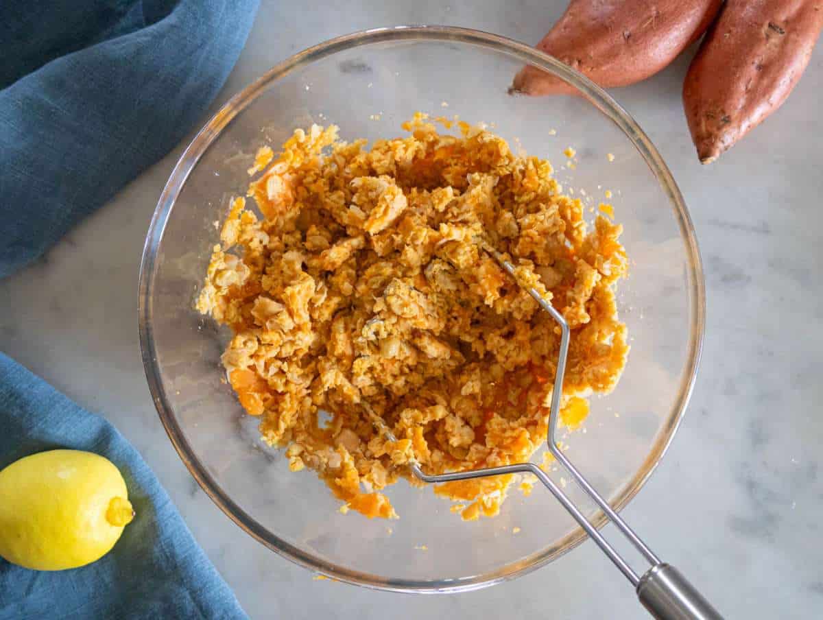 Step 1 – Mashed chickpeas and sweet potato mixture in a large bowl ready to mix.