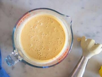 Step 3 Blending part of soup with tahini and lemon for smooth texture and rich flavor.