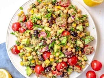 Step 4 Mediterranean quinoa salad with life changing marinade served on a platter.