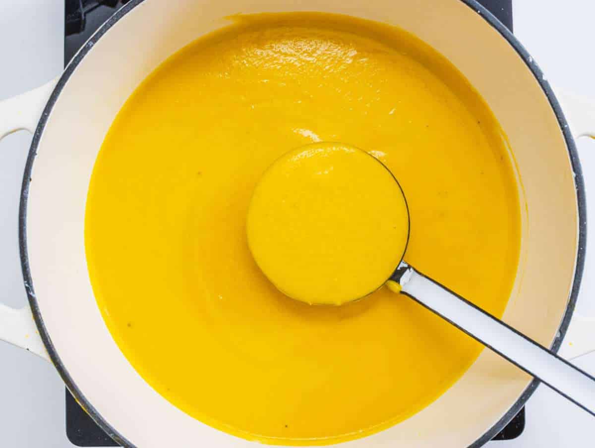 Step 4 Roasted pumpkin coconut milk and broth blended together into a creamy smooth soup.
