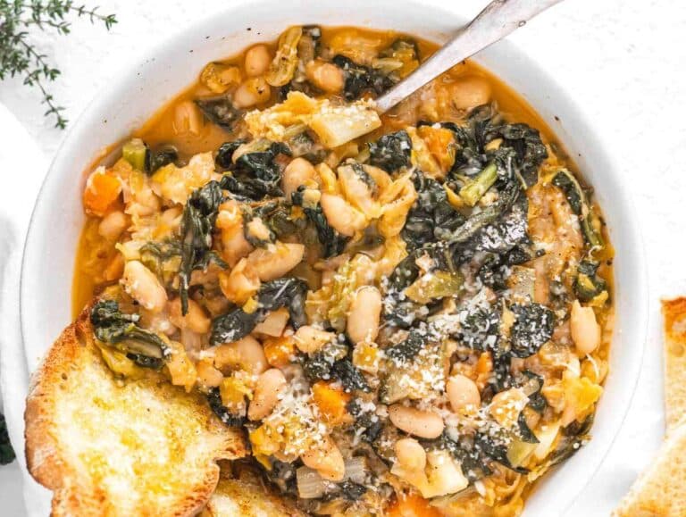 Step 4 Serving Mediterranean cabbage bean stew with toasted bread parmesan and drizzle of olive oil.