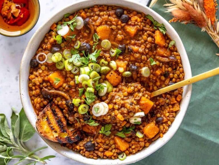 Step 4 Serving lentil pumpkin stew with a drizzle of olive oil and crusty bread.