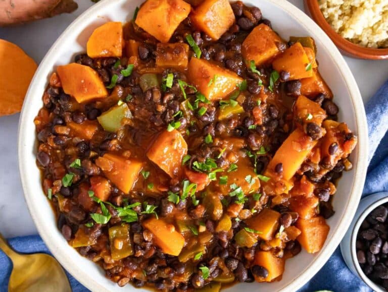 Step 4 image – Serving this healthy black bean chili in a hand-made rustic bowl.