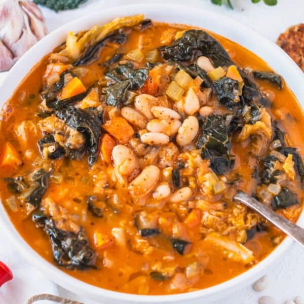 Warm Mediterranean cabbage bean stew with cabbage and beans ready to serve for dinner.