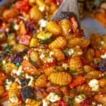 Feature image Greek sheet pan gnocchi baked with veggies and feta for easy Mediterranean dinner.