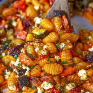 Feature image Greek sheet pan gnocchi baked with veggies and feta for easy Mediterranean dinner.