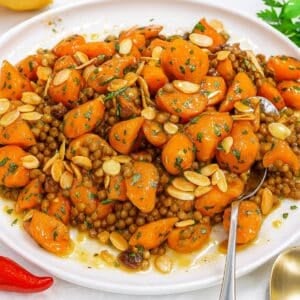 Mediterranean carrot salad close-up with roasted carrots lentils and lemon dressing