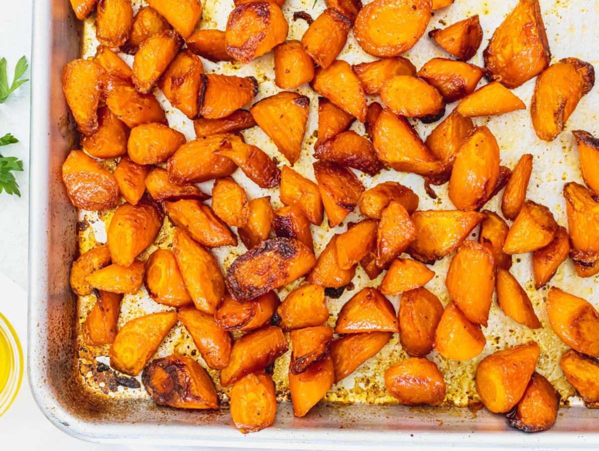 Step 1 Chopped carrots tossed in olive oil and paprika and roasted until tender.