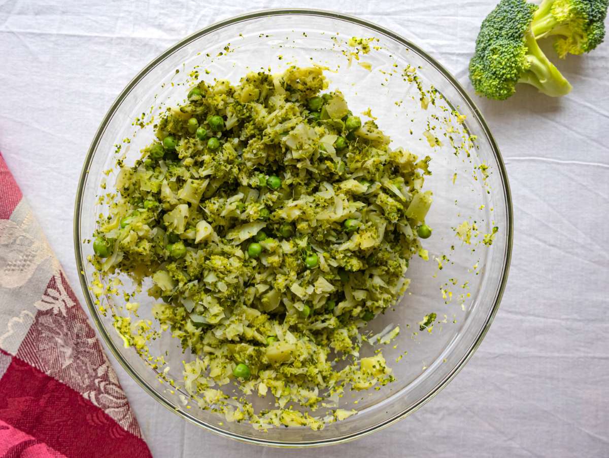 Step 1 Finely chopped broccoli and peas in a bowl after microwaving.