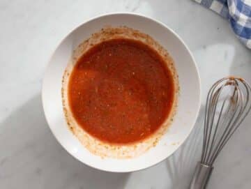 Step 1 Making sauce broth lemon tomato paste and garlic whisked in small bowl.