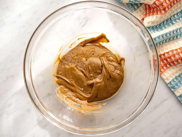 Step 1 Wet ingredients mixed together with almond butter honey vanilla and cinnamon in a large bowl.