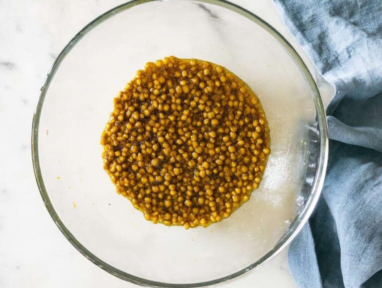 Step 2 Lentils tossed in dressing in large bowl ready for mixing.