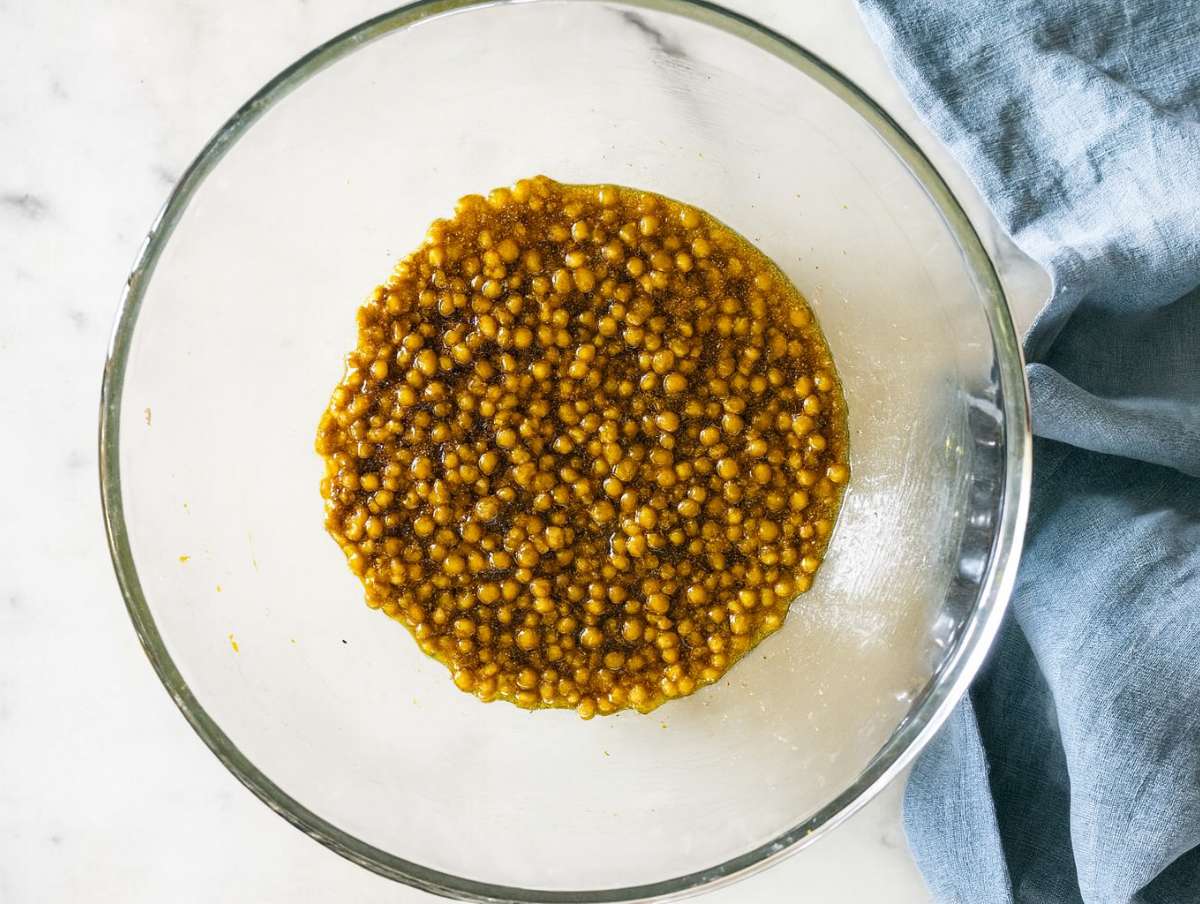 Step 2 Lentils tossed in dressing in large bowl ready for mixing.