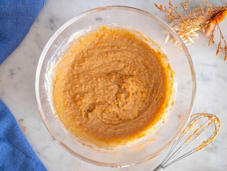 Step 2 Mixing Greek yogurt olive oil spices egg and sugar into mashed sweet potato mixture.