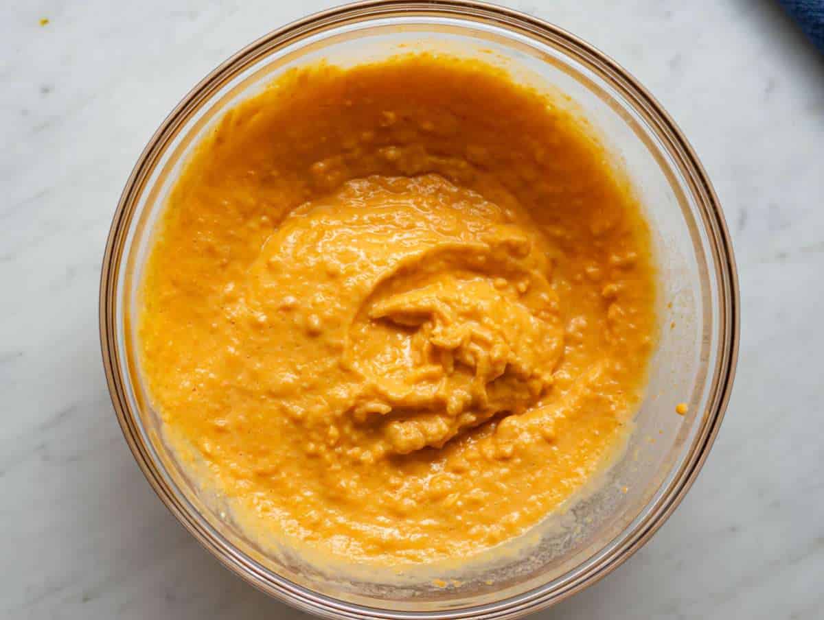 Step 2 Smooth wet ingredients mixed together for healthy sweet potato oatmeal muffins.