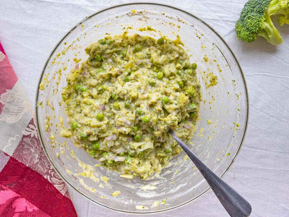 Step 2 Spoonable fritter batter in a bowl ready for cooking.