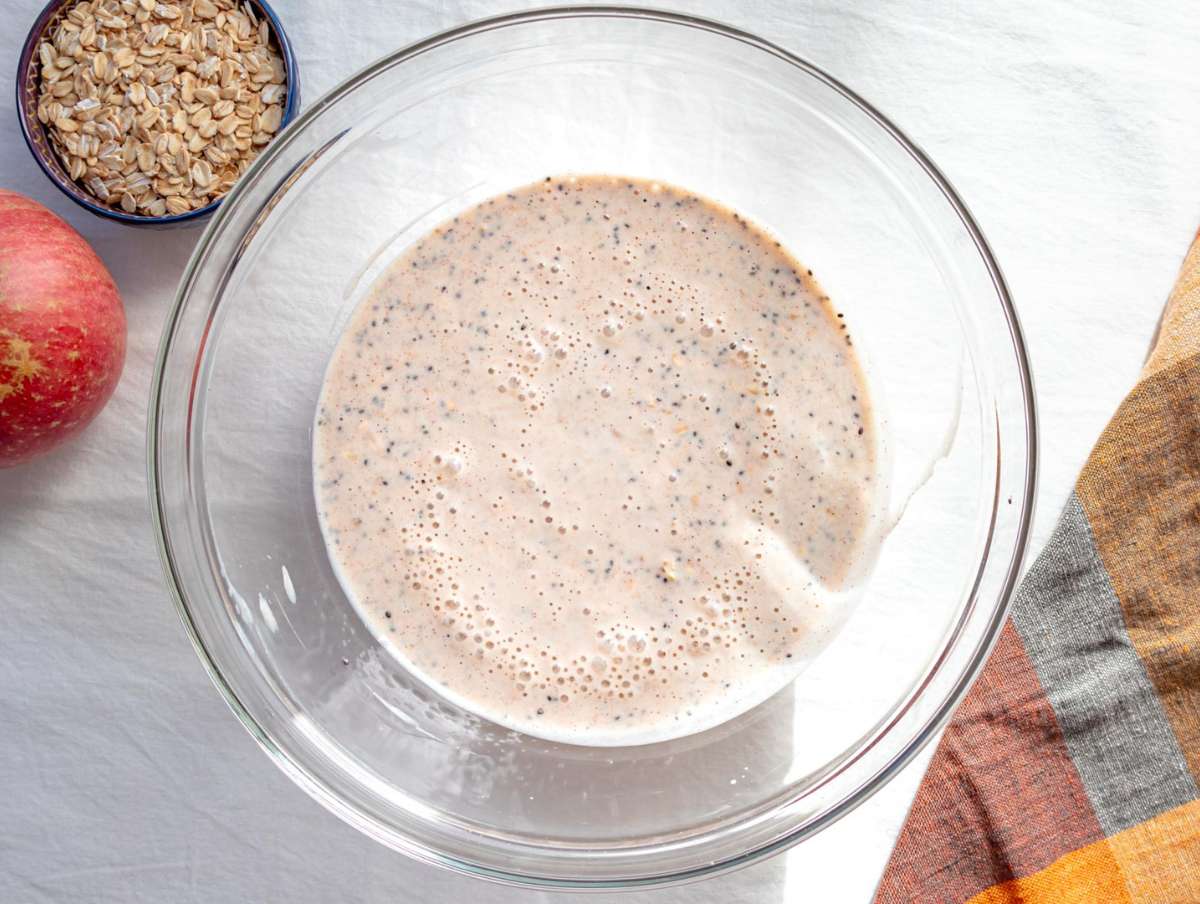 Step 2 Stirring rolled oats and chia seeds into the creamy apple mixture.