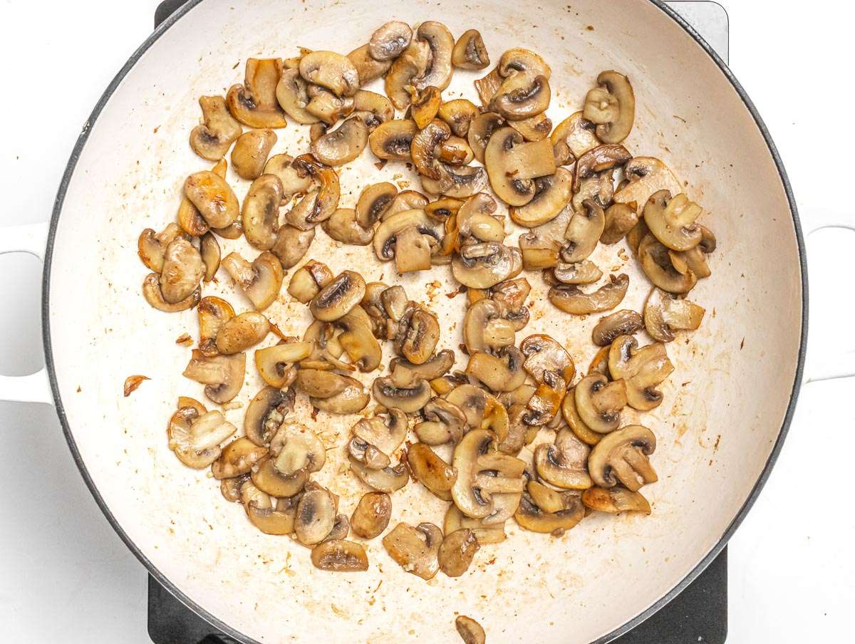 Step 2 sautéing sliced mushrooms until golden and fragrant in large skillet.