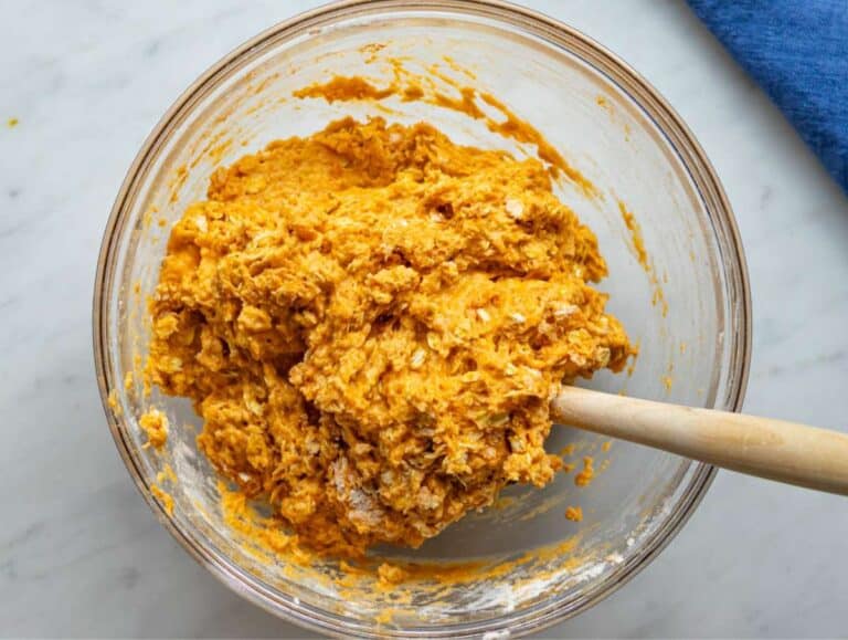 Step 3 Dry ingredients added to bowl creating thick muffin batter with oats and sweet potato.