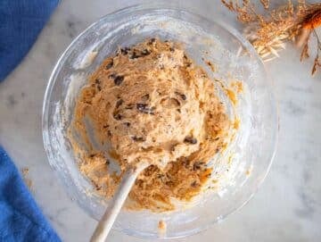 Step 3 Folding dark chocolate chunks into the sweet potato bread mixture before baking.