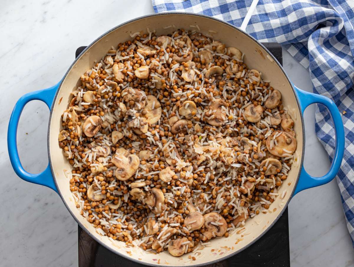 Step 3 Lentils and rice warming together in skillet with vegetables.