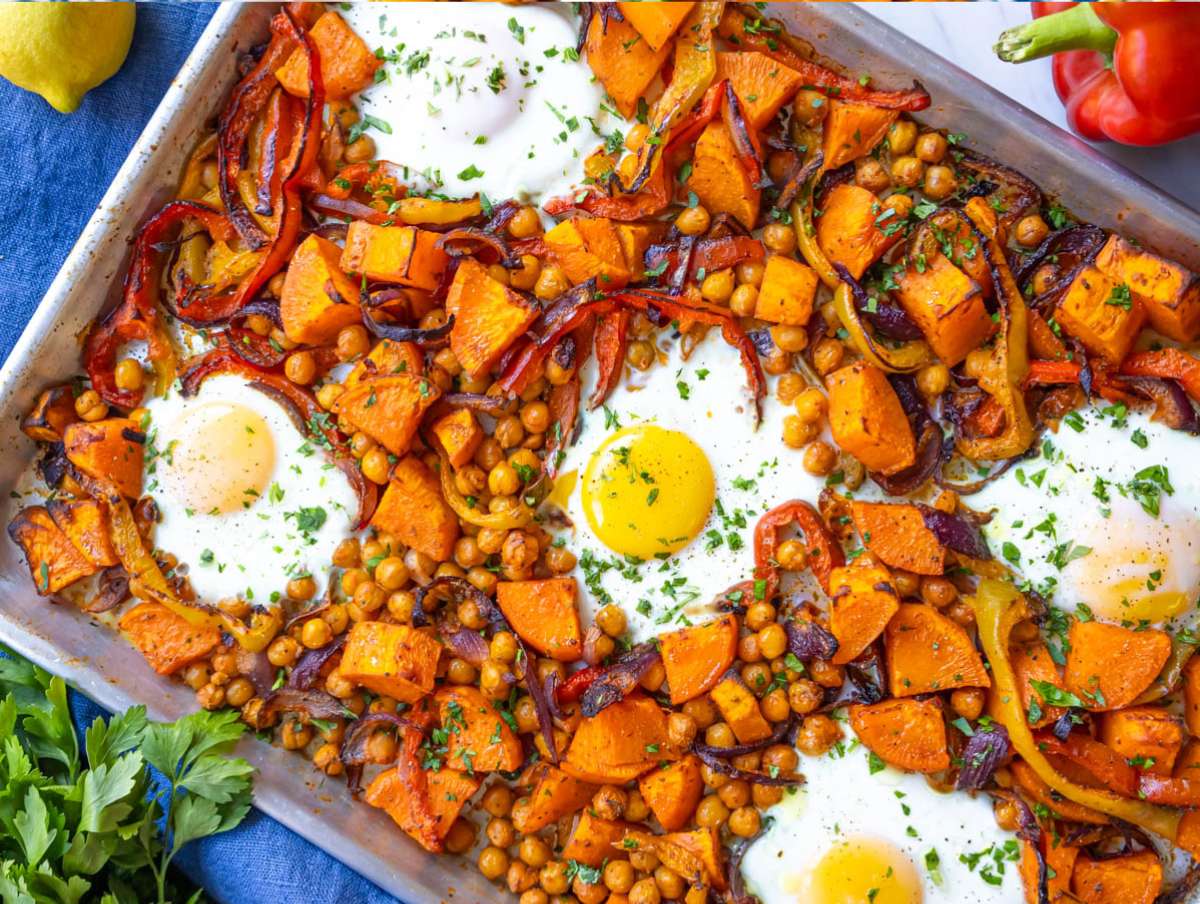 Step 4 Baked sheet pan eggs and veggies right out of the oven topped with parsley.