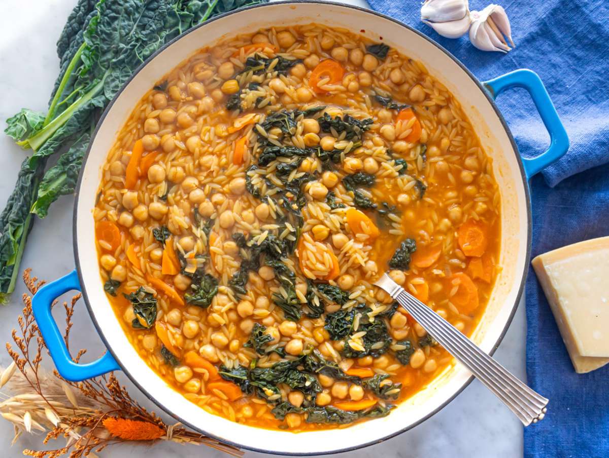 Step 4 Simmering orzo with chickpeas and broth until creamy and tender.