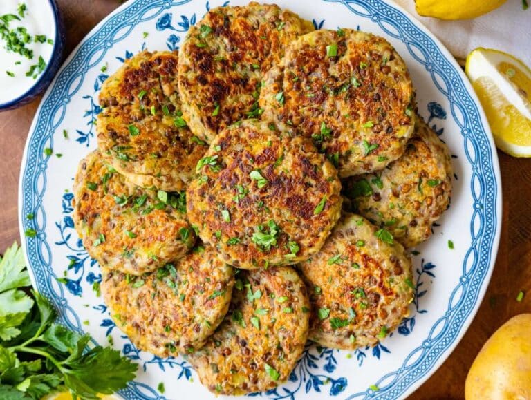 Step 4 image Serving lentil potato patties with Greek yogurt and parsley for a light Mediterranean meal.