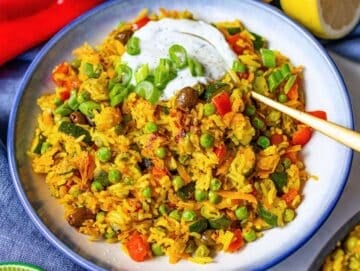 Step 5 Finished stir fry served with green onion tops and lemon yogurt drizzle.