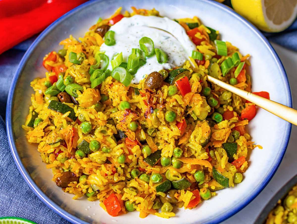 Step 5 Finished stir fry served with green onion tops and lemon yogurt drizzle.